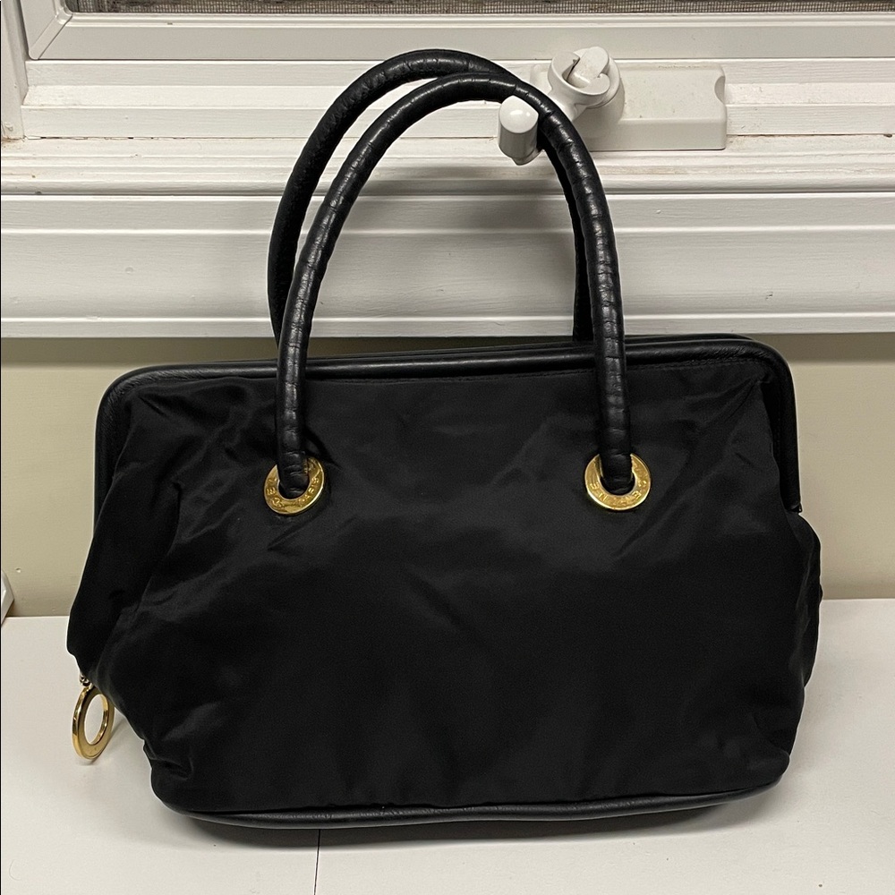 Authentic Celine Elegant Black Handbag with Gold Accents